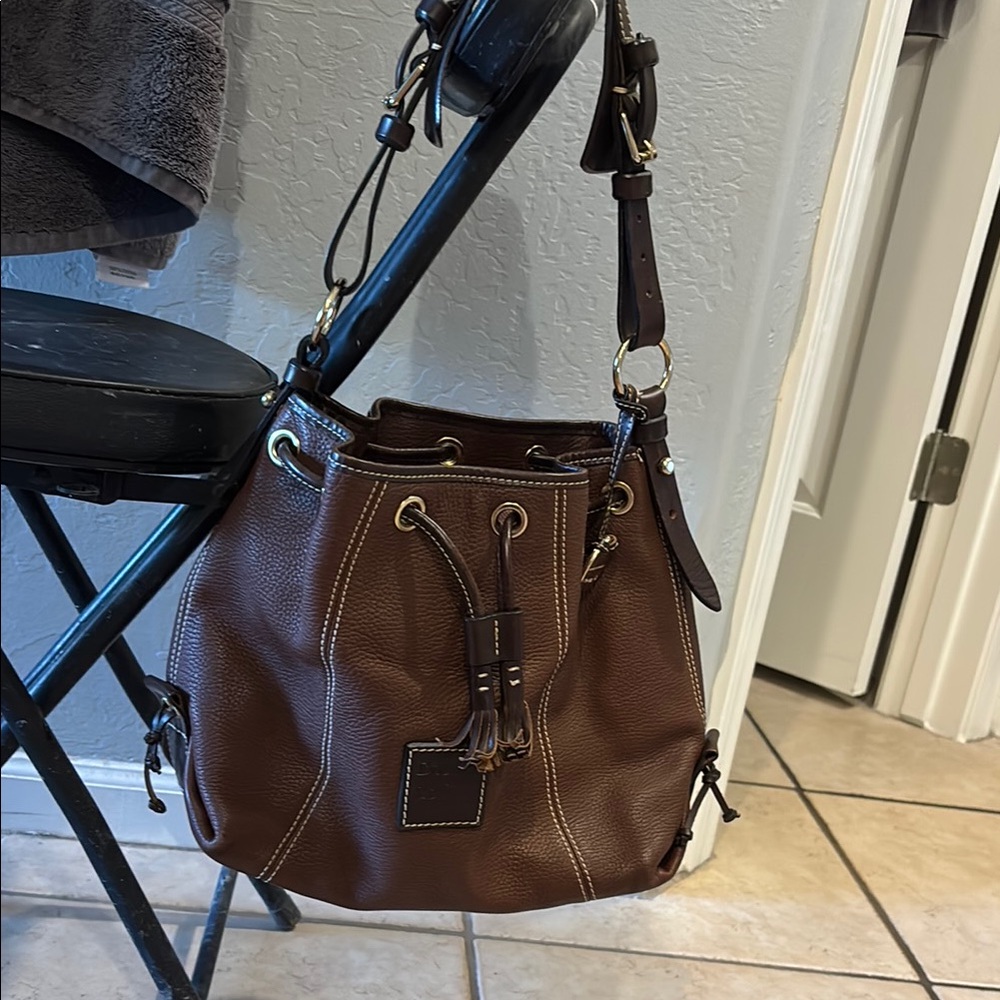 Dooney & Bourke Brown and Gold Shoulder Bag with Drawstring Closure